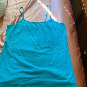 i'm selling this kinda green looking tanktop for $2,size LG (12-14)